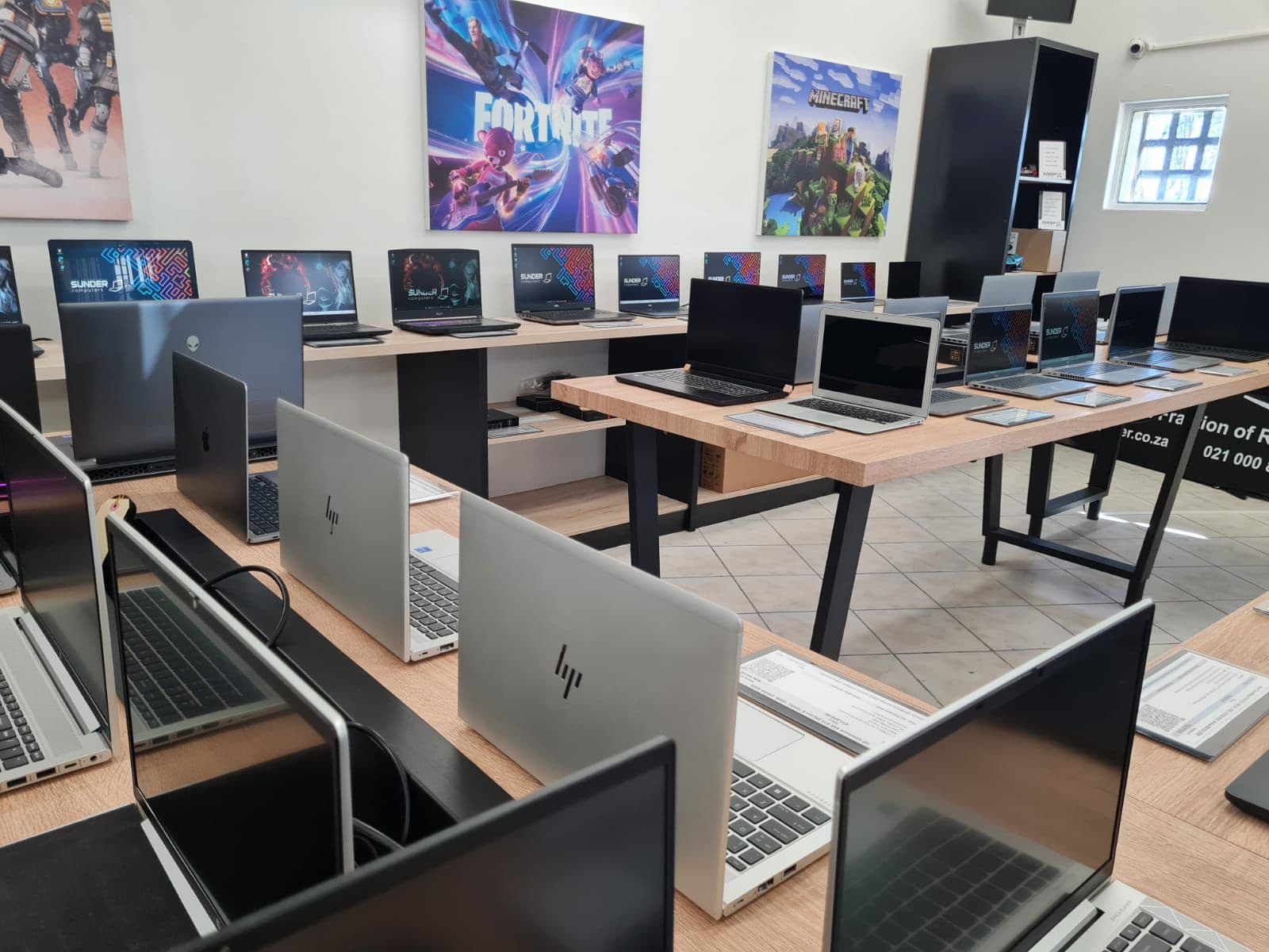 Inside the Sunder Computers showroom, with laptops on display